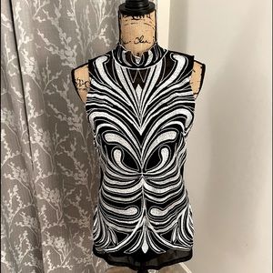 Black and silver top.